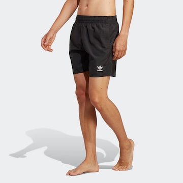 ADIDAS ORIGINALS Board Shorts 'Adicolor Essentials Solid' in Black: front