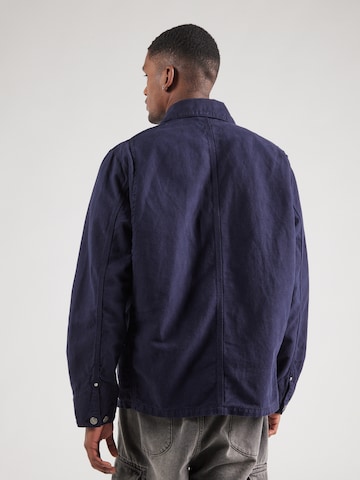 Carhartt WIP Overgangsjakke 'Walter Chore' i blå