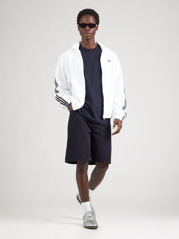 NORSE PROJECTS Loosefit Jeans 'Korshavn' i blå