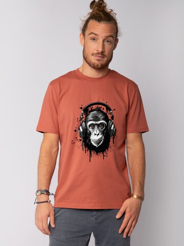 T-Shirt 'Affe hört Musik' Watapparel en rouge : devant