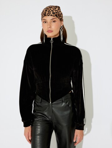 Koton Zip-Up Hoodie in Black: front