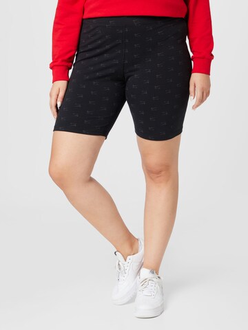 Skinny Leggings de la Nike Sportswear pe negru: față