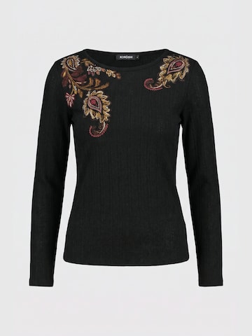 Tricou de la KOROSHI pe negru: față