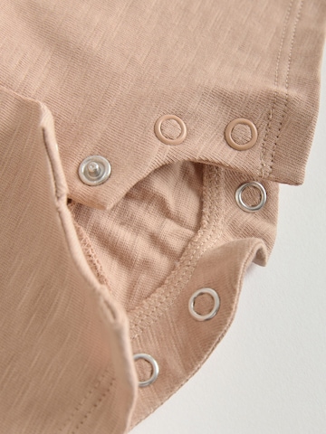 Barboteuse / body Next en beige