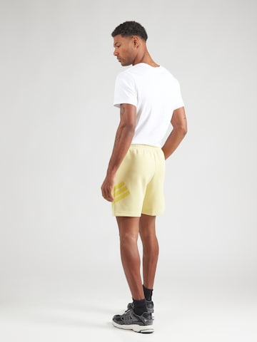 ADIDAS SPORTSWEAR Loose fit Workout Pants 'FI' in Yellow