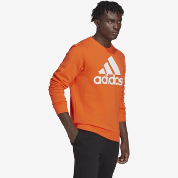 Felpa sportiva 'Essentials' di ADIDAS SPORTSWEAR in arancione