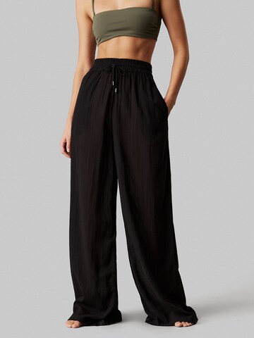 Calvin Klein Swimwear Wide leg Trousers in Black: front