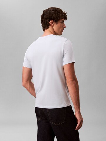 Tricou de la Calvin Klein pe albastru