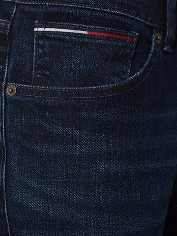 Tommy Jeans جينز واسع من الأسفل جينز 'Ryan' بلون أزرق