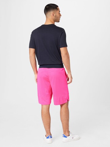 Loosefit Pantaloni 'Legacy' di Champion Authentic Athletic Apparel in rosa