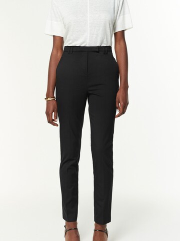 Next Slimfit Byxa i svart: framsida