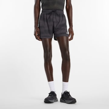 Regular Pantalon de sport 'RC 5' new balance en noir : devant
