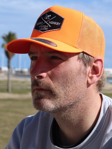 Casquette de sport Surf Monkey en orange