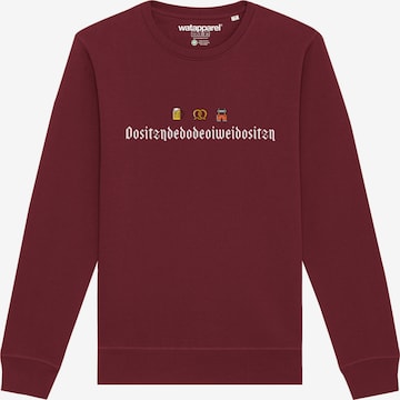 Watapparel Sweatshirt 'Dositzndedodeoiweidositzn' in Rood: voorkant