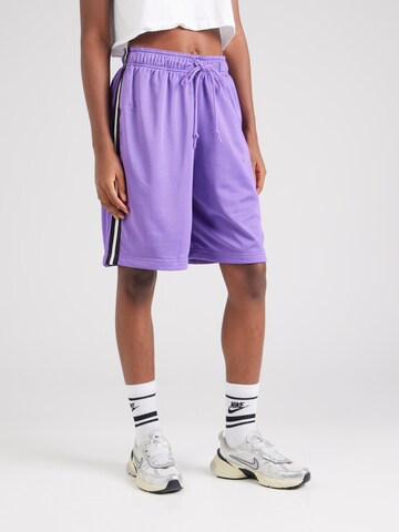 Nike Sportswear Wide leg Trousers in Purple: front