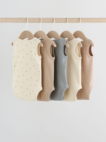 Next Sparkdräkt/body i beige