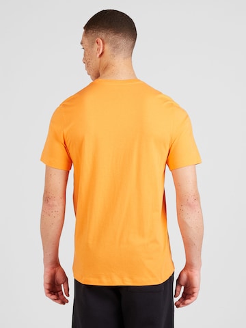 Nike Sportswear Regularny krój Koszulka 'Club' w kolorze pomarańczowy