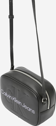 Sac à bandoulière Calvin Klein Jeans en noir : devant