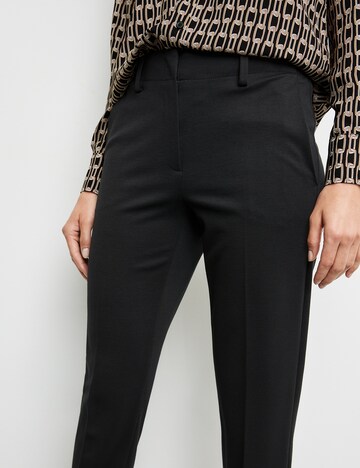 GERRY WEBER Slim fit Trousers with creases in Black