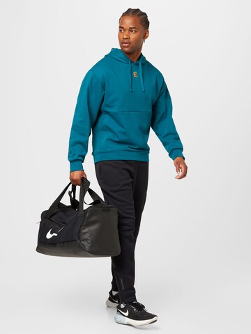 NIKE Sport sweatshirt i blå