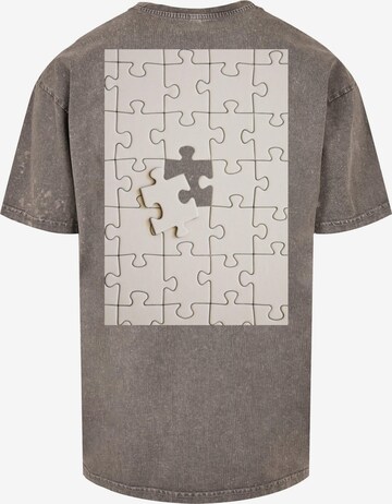 Merchcode T-Shirt 'Missing Piece' in Grau