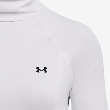 T-shirt fonctionnel 'Train' UNDER ARMOUR en blanc