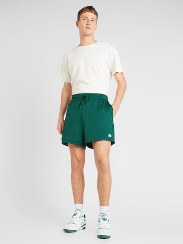 regular Pantaloni di new balance in verde