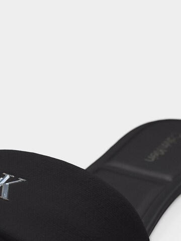 Calvin Klein Пантолеты в Черный