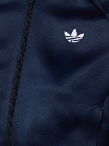 Veste de survêtement ADIDAS ORIGINALS en bleu