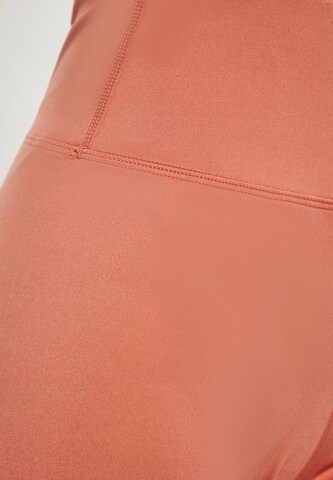 myMo ATHLSR Skinny Sporthose in Orange