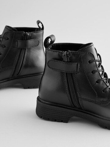 Bottes Next en noir