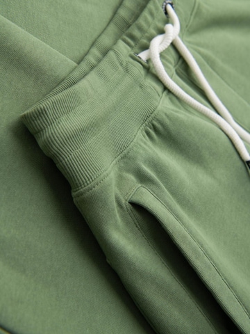 Effilé Pantalon de sport Ombre en vert