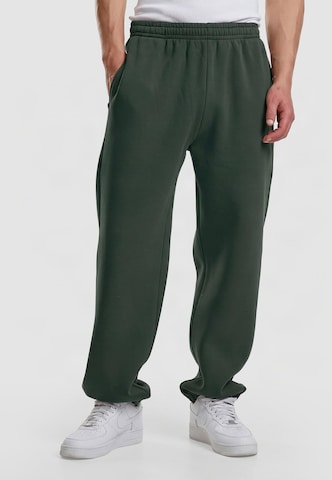 Loosefit Pantaloni di Urban Classics in verde: frontale