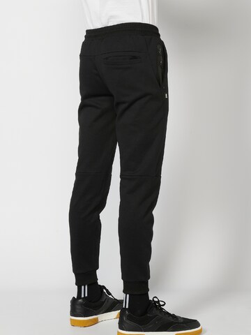 KOROSHI Regular Trousers in Black
