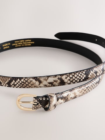 Next - Cinturón en beige