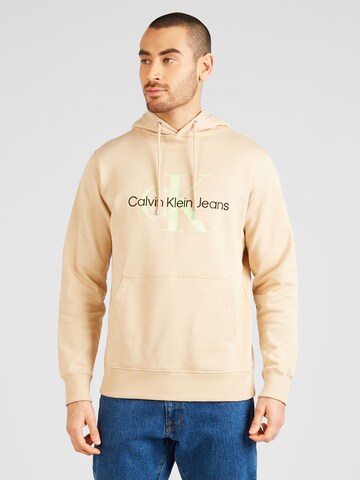 Sweat-shirt Calvin Klein Jeans en beige : devant