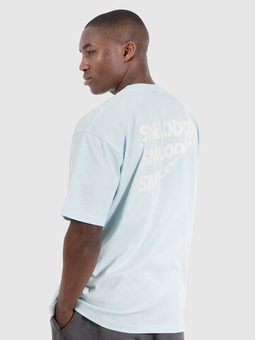 T-Shirt fonctionnel 'Malin' Smilodox en bleu : devant
