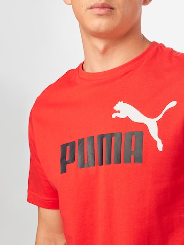 PUMA Performance Shirt 'Essentials' in Red