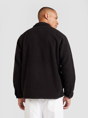 Tommy Jeans Jacke in Schwarz