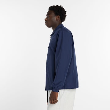 new balance Between-Season Jacket in Blue