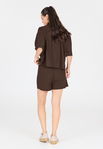 Athlecia Loose fit Sports trousers 'Resort' in Brown