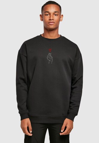Merchcode Sweatshirt 'K Heart' in Schwarz: Vorderseite