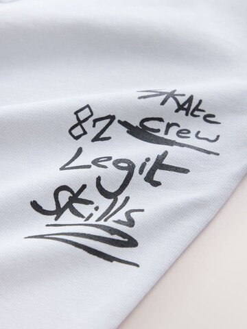 Next - Camiseta en blanco