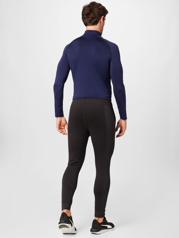 PUMA Tapered Sportbroek in Zwart