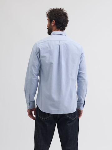Portland Outerwear Company - Ajuste regular Camisa de negocios en azul