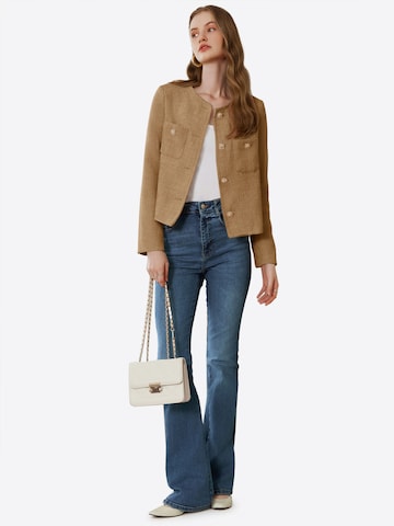 Imily Bela Tussenjas in Bruin