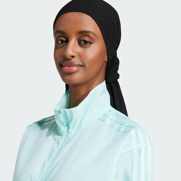 ADIDAS ORIGINALS Tussenjas 'Adicolor' in Blauw