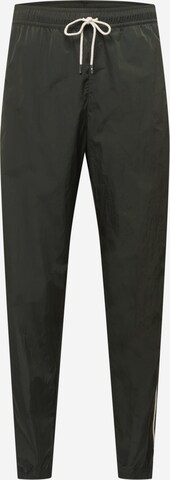 Nike Sportswear Tapered Trousers in Green: front