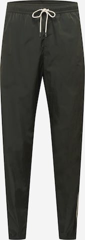 Nike Sportswear Tapered Pants in Green: front