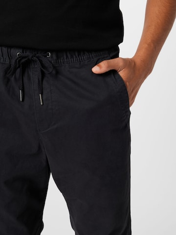 GAP Tapered Housut värissä sininen